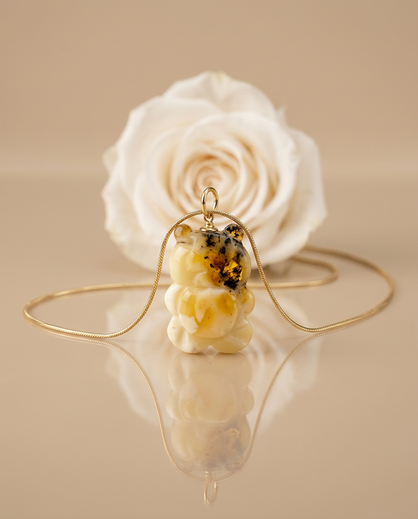 Gintaro pakabukas, auksuotas sidabras 925 "Ramus žaismas"