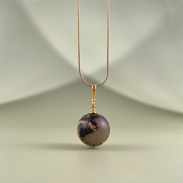 Gintarinis pakabukas, auksuotas sidabras 925 "Planeta"