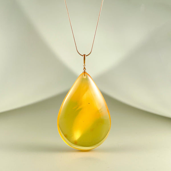 Gintarinis pakabukas, auksuotas sidabras 925 "Plunksnelė"