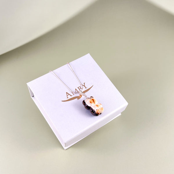 Gintaro pakabukas, sidabras 925 "Sniegutis"