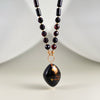 Black amber necklace 51cm, gold-plated silver 925 "Shining in the night"