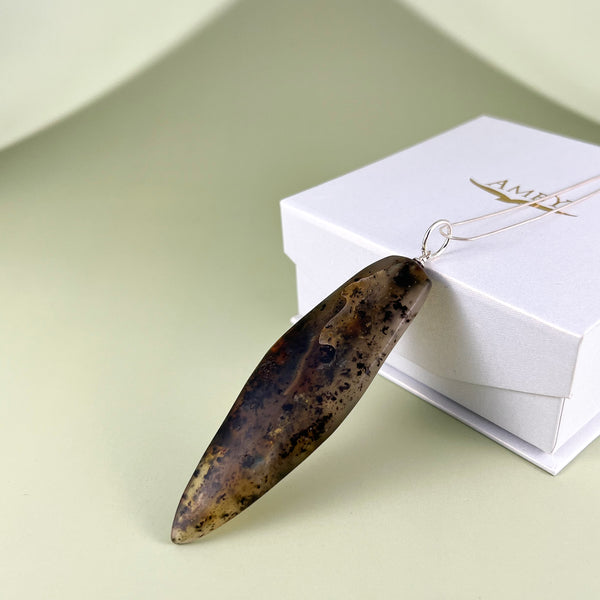 Gintaro pakabukas, sidabras 925 "Iltis"