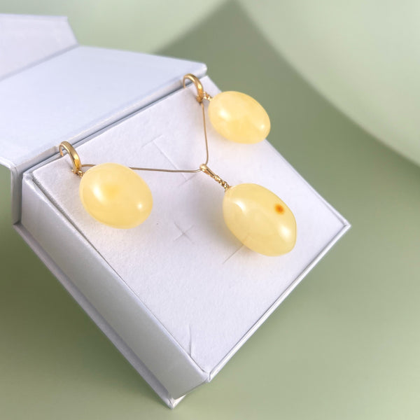 Gintaro rinkinys, auksuotas sidabras 925 "Saulės slyvelės"