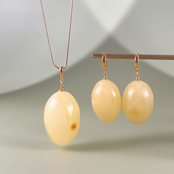 Gintaro rinkinys, auksuotas sidabras 925 "Saulės slyvelės"