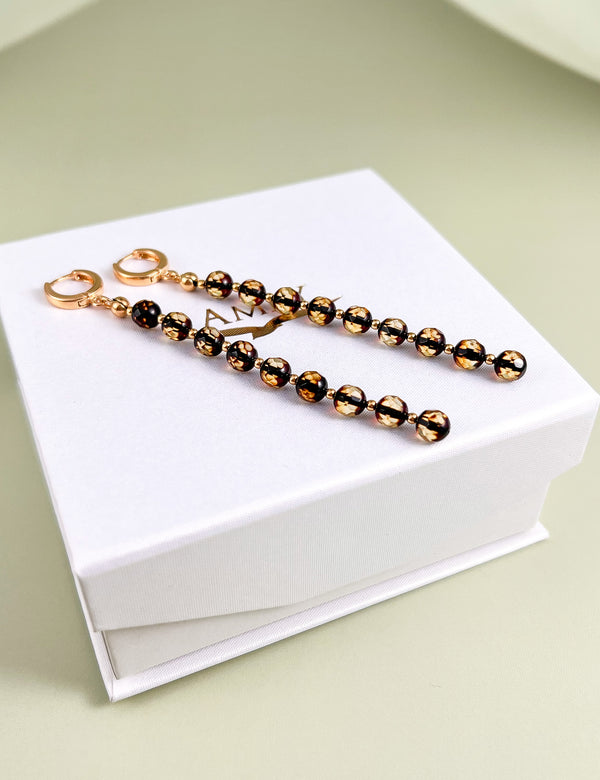 Facetuoto gintaro auskarai, auksuotas sidabras 925 "Žėrutis"