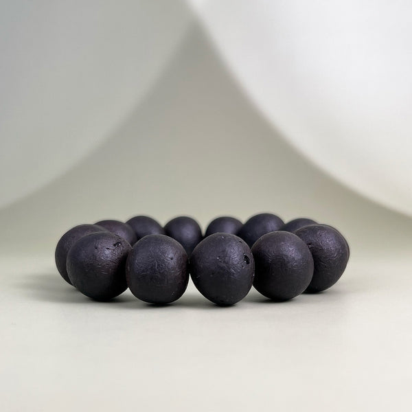 Matte amber bracelet "Black boulders"