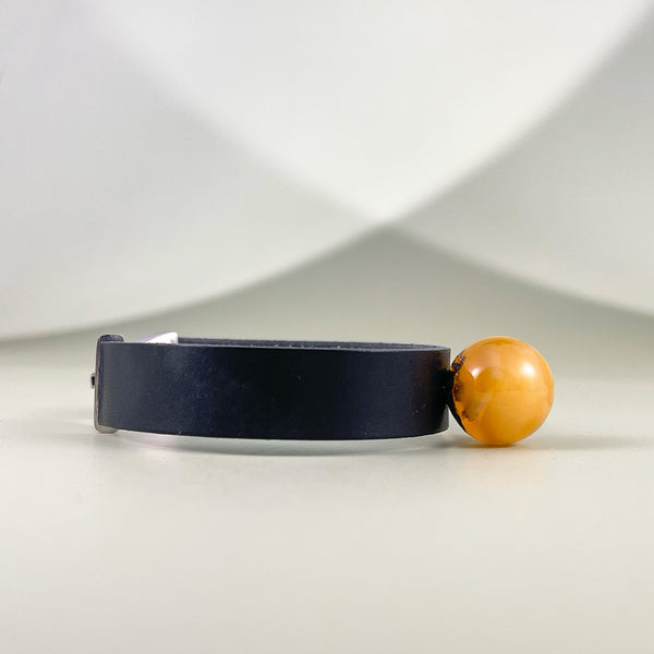 Gintaro apyrankė su oda "Saulė danguje"