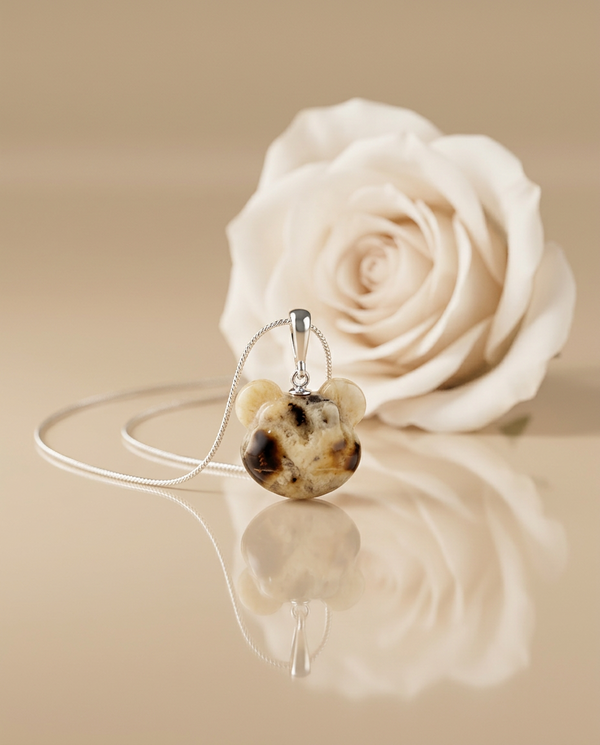 gintaro pakabukas su sidabru