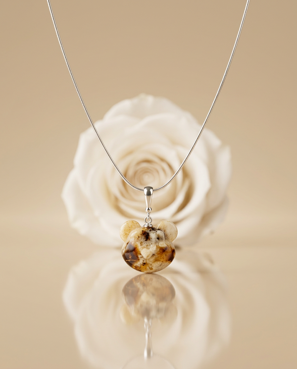 gintaro pakabukas su sidabru