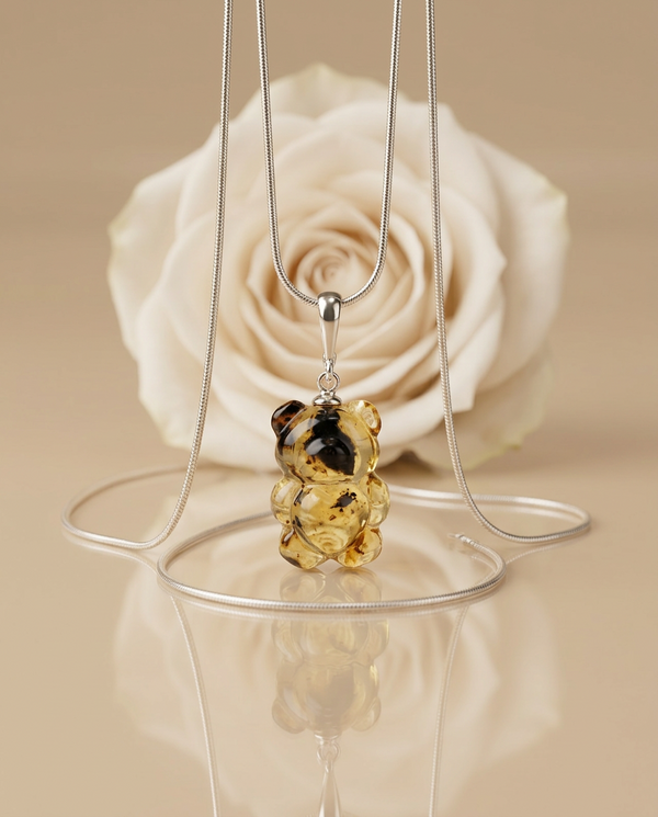 gintaro pakabukas su sidabru