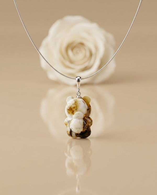 gintaro pakabukas su sidabru