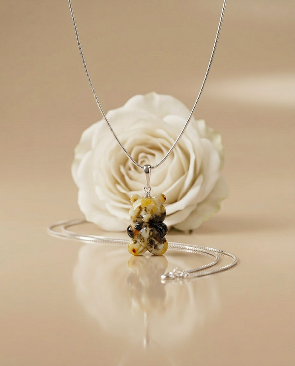 gintaro pakabukas su sidabru