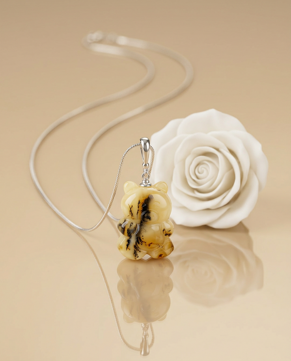 gintaro pakabukas su sidabru