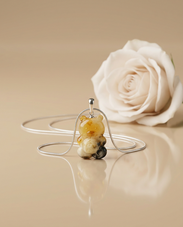 gintaro pakabukas su sidabru