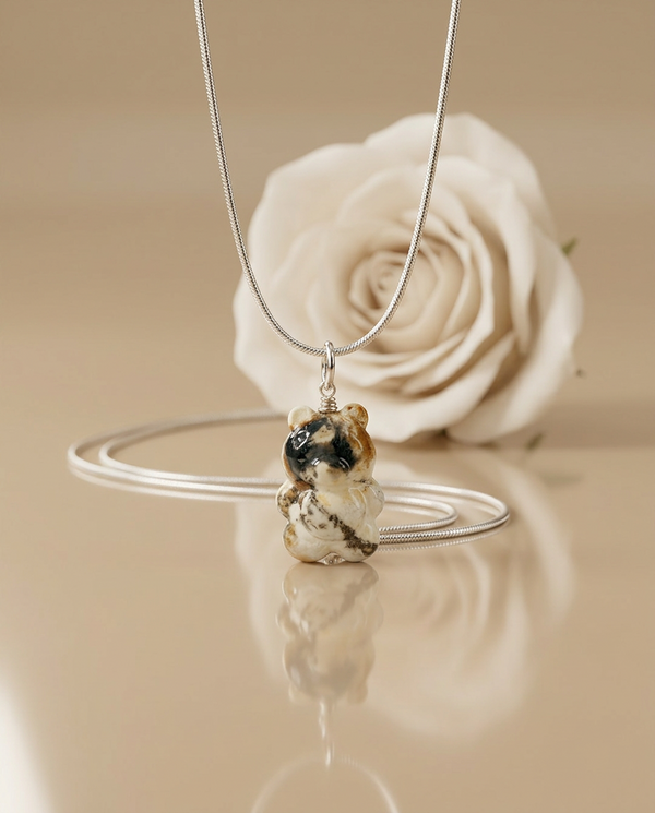 gintaro pakabukas su sidabru