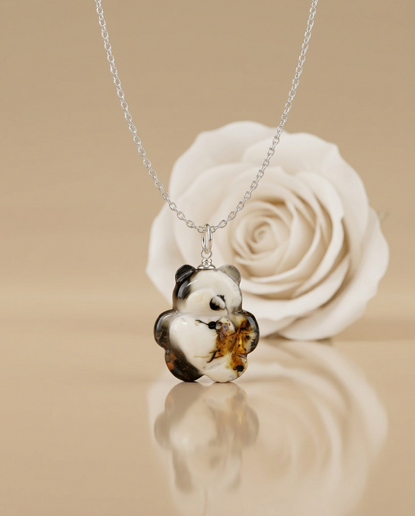 gintaro pakabukas su sidabru