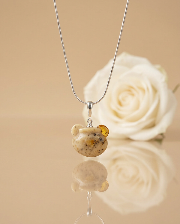 gintaro pakabukas su sidabru