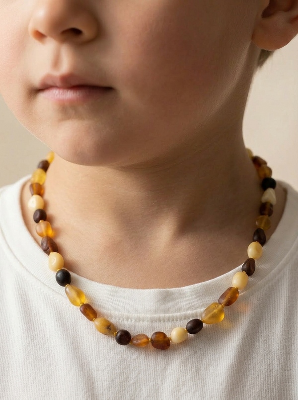 neblizgus gintaro karoliai vaikams