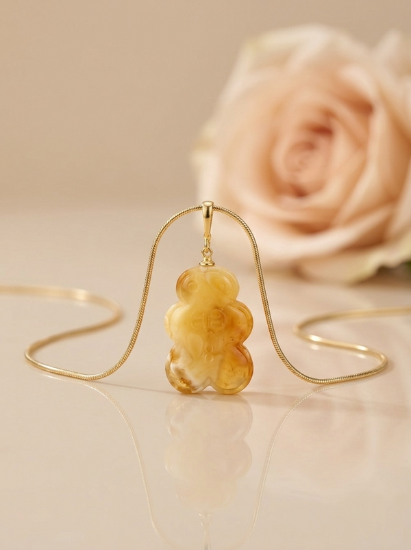 Gintaro pakabukas, auksuotas sidabras 925 "Šilumos talismanas"