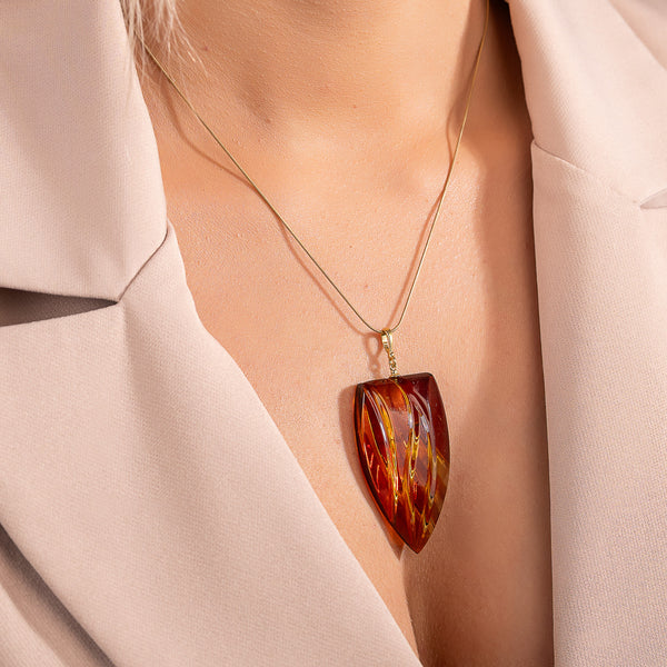 Gintarinis pakabukas, auksuotas sidabras 925 "Liepsna"