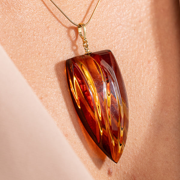 Gintarinis pakabukas, auksuotas sidabras 925 "Liepsna"